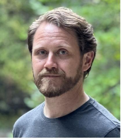 John Aloysius Zenda headshot